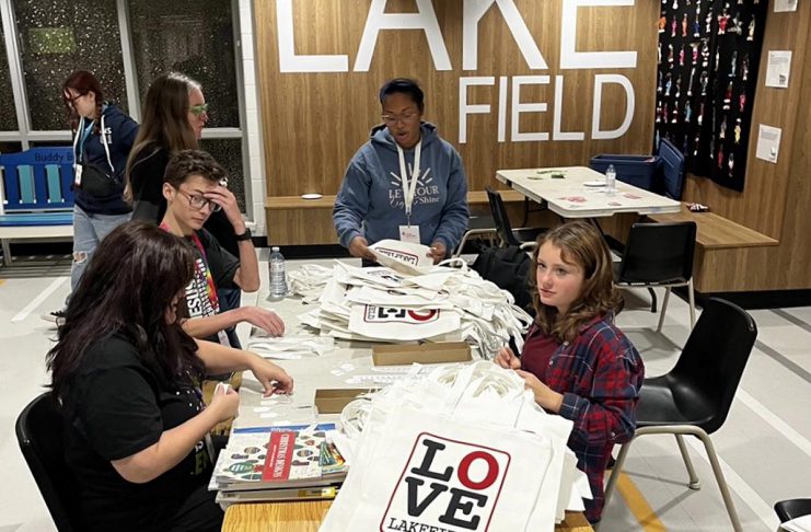 Lakefield Youth Unlimited crafts limited edition ‘Love Lakefield’ tote bags in support of local families in need During the weekly gym nights hosted by the Lakefield Youth Unlimited, youth have been putting price tags on "Love Lakefield" tote bags and including "Love Lakefield" magnets created by a local artist. The tote bags, each with a magnet, are being sold for $20 each in support of the non-profit organization's annual Christmas gift card drive for families in need. Originally designed 10 years ago, the logo found a second life following the October fire that destroyed the Kawartha Home Hardware building, including the upper-level apartments. (Photo: Lakefield Youth Unlimited)