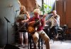 The Chester Babcock Trio (Rob Fortin on guitar and vocals, Susan Newman on vocals and melodica, and John Hoffman on fiddle, mandolin, and vocals) will perform classic jazz songs with special guests Dan Fortin on bass and Aaron Hoffman on piano at Jethro's Bar + Stage in downtown Peterborough on Friday evening. (Photo: Andy Carroll)