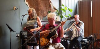 The Chester Babcock Trio (Rob Fortin on guitar and vocals, Susan Newman on vocals and melodica, and John Hoffman on fiddle, mandolin, and vocals) will perform classic jazz songs with special guests Dan Fortin on bass and Aaron Hoffman on piano at Jethro's Bar + Stage in downtown Peterborough on Friday evening. (Photo: Andy Carroll)
