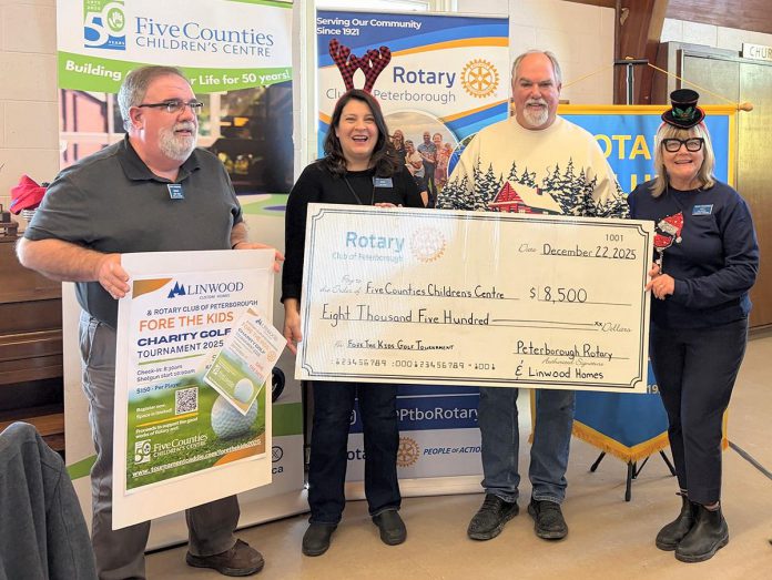 Craig McFarland of Linwood Homes (second from right) and Rotarians (left to right) Brent Perrin, Lyn Giles, and Amy Simpson with an $8,500 cheque for Five Counties Children's Centre at the Rotary Club of Peterborough's annual Christmas lunch at Northminster United Church on December 22, 2025. The Linwood Homes Fore The Kids Golf Tournament in September raised a total of $17,000, which was split equally between the Rotary Club and the regional children's treatment centre, which was originally conceived by Rotarians back in 1970. (Photo courtesy of Rotary Club of Peterborough)