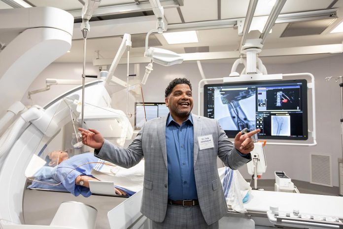 Dr. Fady Abdelsayed, interventional radiologist at Peterborough Regional Health Centre (PRHC), led a donor and media tour on December 9, 2025 of the hospital's interventional radiology suites, including two expanded and upgraded existing suites, a new third suite, and an expansion of the preparation and recovery area, all made possible by a $6 million donor-funded investment. (Photo: Jordan Lyall / kawarthaNOW) Dr. Fady Abdelsayed, interventional radiologist at Peterborough Regional Health Centre (PRHC), led a donor and media tour on December 9, 2025 of the hospital's interventional radiology suites, including two expanded and upgraded existing suites, a new third suite, and an expansion of the preparation and recovery area, all made possible by a $6 million donor-funded investment. (Photo: Jordan Lyall / kawarthaNOW)