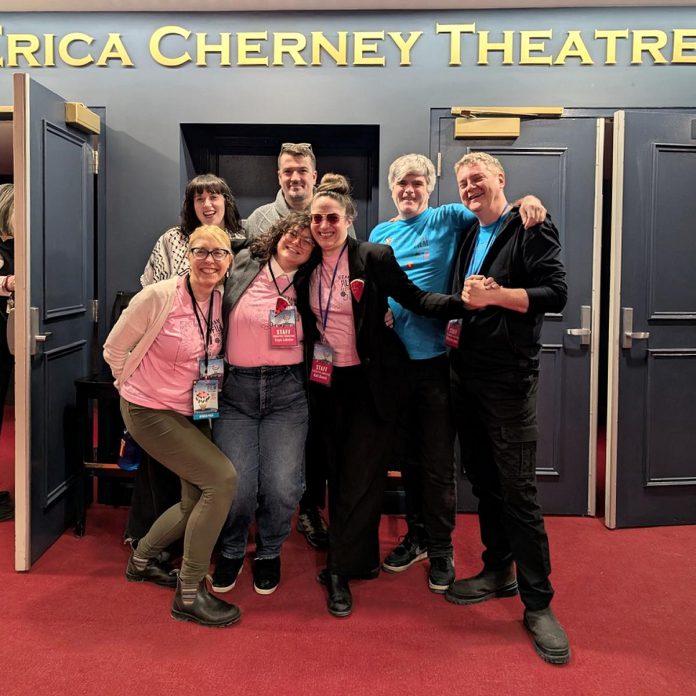 Some members of the ReFrame Film Festival team at Showplace Performance Centre in downtown Peterborough during the 2025 festival, including (front) board chair Melanie Buddle, creative director Eryn Lidster, and executive director Kait Dueck and (back) intern Hannah McCammon, communications officer Michael Morritt, financial controller Michael Goede, and technical lead Philip Fox Jones. (Photo courtesy of ReFrame Film Festival)