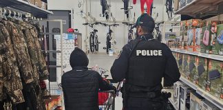 Supported by local businesses and community members, the Cobourg Police Service's annual "Shop with a Cop" program pairs children and youth in need with uniformed police officers, special constables, and auxiliary members for a festive shopping trip followed by lunch and a gift-wrapping session. (Photo: Cobourg Police Service)