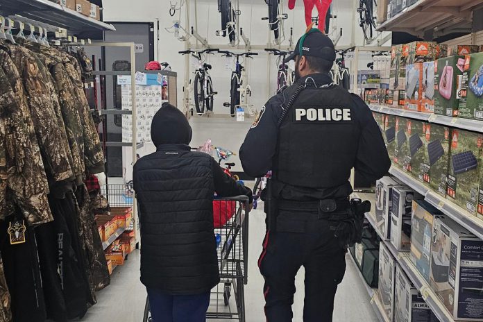 Supported by local businesses and community members, the Cobourg Police Service's annual "Shop with a Cop" program pairs children and youth in need with uniformed police officers, special constables, and auxiliary members for a festive shopping trip followed by lunch and a gift-wrapping session. (Photo: Cobourg Police Service)