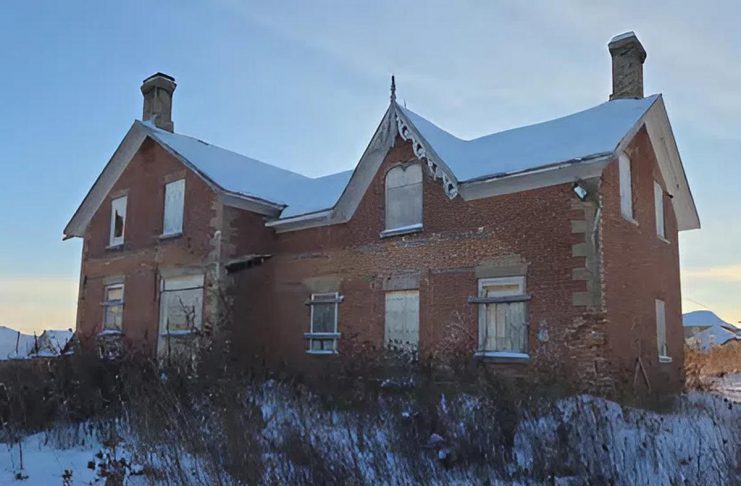 The Peterborough Architectural Conservation Advisory Committee (PACAC) will make a decision on January 21, 2026 to recommend to city council whether this historic farmhouse at 314 Carnegie Avenue should be removed from the city's heritage register or given heritage designation. In November, the city ordered owner Activa Holdings Inc. to demolish the building due to its deteriorating state. (Photo: D.M. Wills Associates Limited)