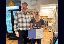 Peterborough-Kawartha MPP Dave Smith with Cheesy Fromage owner Tanya Bailey and her Rural Entrepreneur award from Ontario's Ministry of Rural Affairs. The Lakefield business owner was formally presented with the inaugural award as part of the first Rural Inspiration Awards event at the Rural Ontario Municipalities Association (ROMA) conference in Toronto on January 19, 2026. (Photo: Office of Dave Smith)