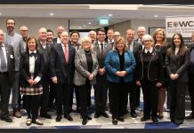 Provincial cabinet ministers, MPs and MPPs, municipal leaders, and representatives from provincial associations and agencies attended the annual general meeting of the Eastern Ontario Wardens' Caucus (EOWC) on January 9, 2026 in Kingston, where Peterborough County warden Bonnie Clark (front row, fourth from left) was acclaimed as EOWC chair for the second year in a row. (Photo: EOWC)