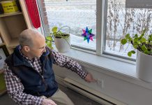 Lower your heating bills and stay warm by sealing air leaks in your home GreenUP energy advisor Bryn Magee points to an electrical outlet on an exterior wall in the GreenUP office. In many older buildings, electrical outlets are sources of air leakage. Foam gaskets and plug protectors can help to staunch the flow of cold air. (Photo: Clara Blakelock / GreenUP)