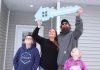 Kayla and Jimmy, pictured with two of their three children, received the keys to their new four-bedroom home in Fraserville during a dedication ceremony on January 11, 2026. The home was made possibly through Habitat for Humanity Peterborough & Kawartha Region's homeownership program along with a $100,000 donation from the former Bailieboro-Springville United Church and a land donation from congregation members Don and Pat Wood. (Photo: Habitat for Humanity Peterborough & Kawartha Region)