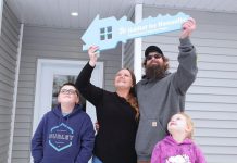 Kayla and Jimmy, pictured with two of their three children, received the keys to their new four-bedroom home in Fraserville during a dedication ceremony on January 11, 2026. The home was made possibly through Habitat for Humanity Peterborough & Kawartha Region's homeownership program along with a $100,000 donation from the former Bailieboro-Springville United Church and a land donation from congregation members Don and Pat Wood. (Photo: Habitat for Humanity Peterborough & Kawartha Region)