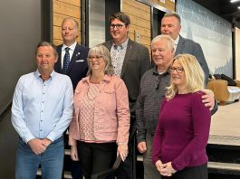 Junior Achievement of Northern and Eastern Ontario (JA-NEO) announced the nine inductees of the 2026 Business Hall of Fame in the lobby of the Venture North building in downtown Peterborough on January 14, 2026. Pictured left to right, front to back: Vance Robbins, Brenda Ibey, Jason and Niki Pulchinski, Peter Blodgett, Jim Bailey, and Chuck White. Not pictured: Dave Bucholtz and Martha Sullivan. (Photo: JA-NEO)