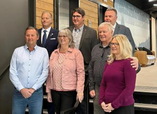 Junior Achievement of Northern and Eastern Ontario (JA-NEO) announced the nine inductees of the 2026 Business Hall of Fame in the lobby of the Venture North building in downtown Peterborough on January 14, 2026. Pictured left to right, front to back: Vance Robbins, Brenda Ibey, Jason and Niki Pulchinski, Peter Blodgett, Jim Bailey, and Chuck White. Not pictured: Dave Bucholtz and Martha Sullivan. (Photo: JA-NEO)