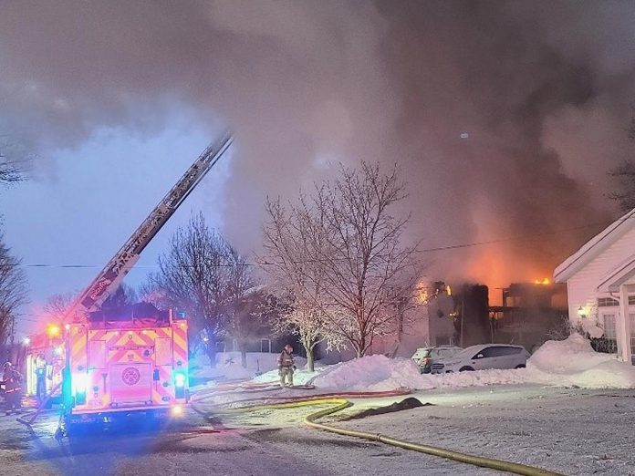 Firefighters battle a blaze that broke out in the early morning hours of January 30, 2026 at Maple Court Apartments at 8 King Street West in Colborne. Around 20 residents at the seniors' apartment complex operated by Northumberland County Housing Corporation have been displaced, with one resident missing. (Photo: Northumberland County OPP)