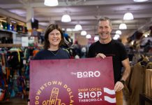 Katy Shufelt, pictured with Scott Murson of Wild Rock Outfitters, won the grand prize draw of $1,500 in Boro gift cards as part of the annual Holiday Shopping Passport program organized by the Peterborough Downtown Business Improvement Area (DBIA). Shufelt is donating a portion of her prize to Wild Rock's ComPassion Project, which raises funds and awareness for six local organizations working on the front lines of social and environmental change. (Photo: Peterborough DBIA)