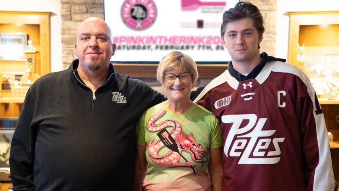 Peterborough Petes merchandise director Mark Million, Survivors Abreast board of directors president Janice James, and Petes captain Carson Cameron during a media conference at the Peterborough Memorial Centre on January 6, 2024 where details of the 17th annual Pink in the Rink campaign were announced. (Photo: Connor Massie / Peterborough Petes)