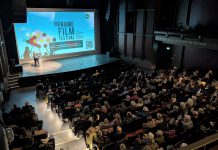 The audience at Showplace Performance Centre in downtown Peterborough during the 2025 ReFrame Film Festival. According to the festival's executive director Kait Dueck, ReFrame brings people together for thought-provoking shared experiences that can help counter physical and emotional isolation during what is figuratively and literally the darkest time of the year. The 2026 festival runs in-person in downtown Peterborough from January 30 to February 1 and online across Canada from February 3 to 8. (Photo courtesy of ReFrame Film Festival)