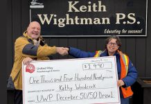 United Way Peterborough & District now at 90% of its $1.6M community campaign goal United Way Peterborough & District CEO Jim Russell presents a cheque to Kathy Woodcock, a special education resource teacher with the Kawartha Pine Ridge District School Board, during a visit to Keith Wightman Public School on January 9, 2026, representing Woocock's share of the proceeds of the United Way's December 50/50 draw. (Photo: United Way)