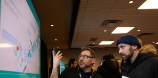 Raymond Beshro, Alto's director of urban interaction, speaks with an attendee during an open house on the proposed high-speed rail network between Toronto and Quebec City held at the McDonnel Street Activity Centre in Peterborough on February 26, 2026. (Photo: Jordan Lyall / kawarthaNOW)