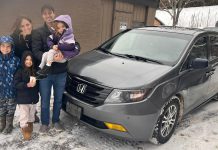 Josh and Ana Mourtzanos with their children and "Caleb the Honda," the family's Honda Odyssey minivan they donated to the Bancroft Community Transit (BCT) in December 2025 before the family moved out of the country. The non-profit rural transportation organization says the family's generous donation has made a huge difference as BCT continues to fundraise to replace several aging vehicles. (Photo courtesy of BCT)