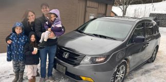 Josh and Ana Mourtzanos with their children and "Caleb the Honda," the family's Honda Odyssey minivan they donated to the Bancroft Community Transit (BCT) in December 2025 before the family moved out of the country. The non-profit rural transportation organization says the family's generous donation has made a huge difference as BCT continues to fundraise to replace several aging vehicles. (Photo courtesy of BCT)