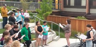 Volunteer-led organization Big Sing Nogojiwanong-Peterborough leads a community of singers of all ages and skill levels during the first free group choir event held on June 14, 2025 at the Jalynn Bennett Amphitheatre at Trent University's Traill College. The organization was formed to provide a free, inclusive, and informal space for community members to connect and engage in song. The group will be singing "Defying Gravity" on March 6, 2026 at 7 p.m. at Peterborough Square. (Photo courtesy of Big Sing Nogojiwanong-Peterborough)