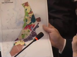 Peterborough mayor Jeff Leal displays a map showing the Coldsprings growth area at the southern edge of the city during a general committee meeting on February 17, 2026 where council unanimously approved allocating funding for a secondary planning study, with the city considering the area as an ideal location for an Alto high-speed rail station due to its large area, proximity to existing transportation facilities, and "relatively unencumbered land use pattern." (kawarthaNOW screenshot of City of Peterborough video)