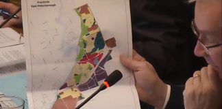 Peterborough mayor Jeff Leal displays a map showing the Coldsprings growth area at the southern edge of the city during a general committee meeting on February 17, 2026 where council unanimously approved allocating funding for a secondary planning study, with the city considering the area as an ideal location for an Alto high-speed rail station due to its large area, proximity to existing transportation facilities, and "relatively unencumbered land use pattern." (kawarthaNOW screenshot of City of Peterborough video)