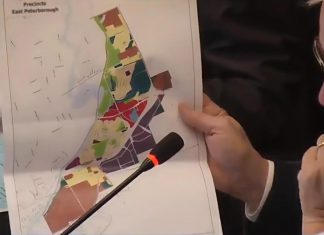 Peterborough mayor Jeff Leal displays a map showing the Coldsprings growth area at the southern edge of the city during a general committee meeting on February 17, 2026 where council unanimously approved allocating funding for a secondary planning study, with the city considering the area as an ideal location for an Alto high-speed rail station due to its large area, proximity to existing transportation facilities, and "relatively unencumbered land use pattern." (kawarthaNOW screenshot of City of Peterborough video)