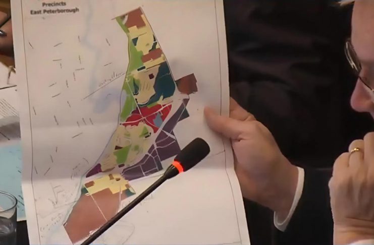 Peterborough mayor Jeff Leal displays a map showing the Coldsprings growth area at the southern edge of the city during a general committee meeting on February 17, 2026 where council unanimously approved allocating funding for a secondary planning study, with the city considering the area as an ideal location for an Alto high-speed rail station due to its large area, proximity to existing transportation facilities, and "relatively unencumbered land use pattern." (kawarthaNOW screenshot of City of Peterborough video)