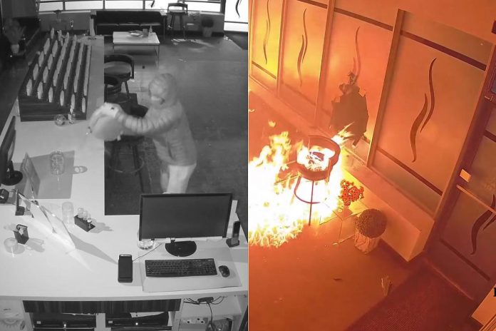 An arsonist spreads gasoline around DashVapes in Mapleridge Plaza at 1840 Lansdowne Street West in Peterborough in the early morning hours of February 5, 2026 before exiting through a broken storefront window and setting the gasoline on fire. (kawarthaNOW screenshots of Facebook video)