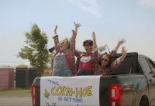 Nadine Djoury, Naomi Snieckus, and Paloma Nuñez in the Lindsay episode of "I'm Also Here," a new comedy anthology TV series produced by Firecracker Department and C'mon Mort Productions and premiering on Bell Fibe TV1 on February 12, 2026. Entirely written, directed, and starring women and non-binary artists, each episode of the six-part series explores a different Ontario small town, including Lindsay, Cobourg, and Bobcaygeon. The Lindsay episode, about an indecisive bride who finds herself forced to choose which friendships deserve a place beside her, was filmed at the Cornapalooza cornhole festival in Lindsay. (Screenshot courtesy of Firecracker Department)