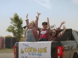 Nadine Djoury, Naomi Snieckus, and Paloma Nuñez in the Lindsay episode of "I'm Also Here," a new comedy anthology TV series produced by Firecracker Department and C'mon Mort Productions and premiering on Bell Fibe TV1 on February 12, 2026. Entirely written, directed, and starring women and non-binary artists, each episode of the six-part series explores a different Ontario small town, including Lindsay, Cobourg, and Bobcaygeon. The Lindsay episode, about an indecisive bride who finds herself forced to choose which friendships deserve a place beside her, was filmed at the Cornapalooza cornhole festival in Lindsay. (Screenshot courtesy of Firecracker Department)