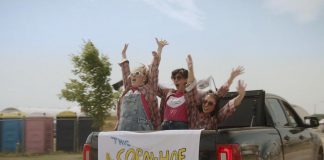 Nadine Djoury, Naomi Snieckus, and Paloma Nuñez in the Lindsay episode of "I'm Also Here," a new comedy anthology TV series produced by Firecracker Department and C'mon Mort Productions and premiering on Bell Fibe TV1 on February 12, 2026. Entirely written, directed, and starring women and non-binary artists, each episode of the six-part series explores a different Ontario small town, including Lindsay, Cobourg, and Bobcaygeon. The Lindsay episode, about an indecisive bride who finds herself forced to choose which friendships deserve a place beside her, was filmed at the Cornapalooza cornhole festival in Lindsay. (Screenshot courtesy of Firecracker Department)