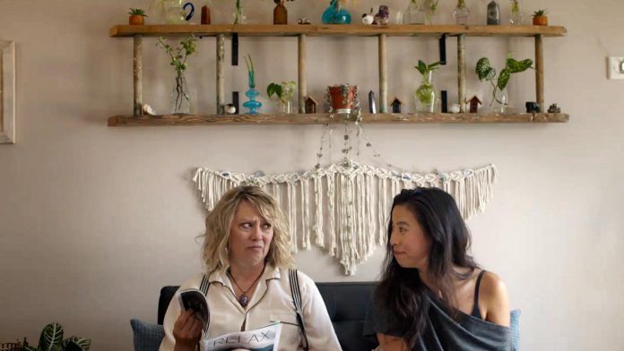 Naomi Snieckus and Krista Jang star in the Cobourg episode of "I'm Also Here" ," a new comedy anthology TV series produced by Firecracker Department and C'mon Mort Productions and premiering on Bell Fibe TV1 on February 12, 2026. Filmed at The Healing Centre in Cobourg, the episode features anthropomorphized emotions Anxiety and Self-Doubt battling for dominance. (Screenshot courtesy of Firecracker Department)