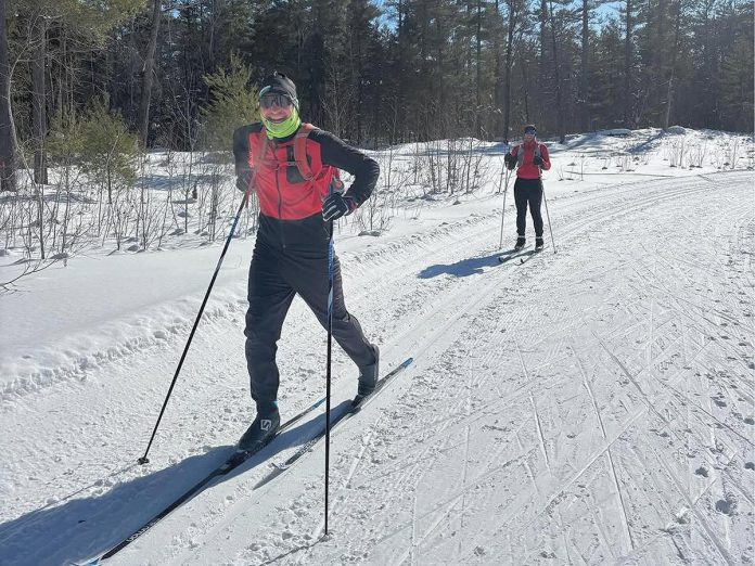 Two of the many cross-country skiers who participated in the Kawartha Nordic ComPassion Relay at Kawartha Nordic Ski Club in North Kawartha Township on January 31, 2026, raising just over $18,000 for the ComPassion Project supporting six local organizations. (Photo: Kawartha Nordic / Instagram)