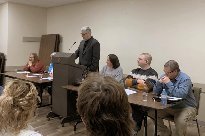 David Berger, president of the Kawartha Pine Ridge Elementary Teachers Federation of Ontario (EFTO) Teachers Local, moderated a panel during an "education emergency townhall" about the Ontario government's Bill 33, Supporting Children and Students Act (2025) on February 23, 2026 at the Peterborough Lions Community Centre. (Photo: Bethan Bates / kawarthaNOW)