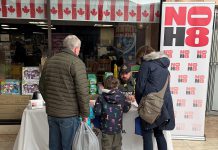 A member of the Peterborough Police Service at a booth during Family Literacy Day at Peterborough Square on January 24, 2026 sharing information with the community about the refreshed N0H8 ("No Hate") public education and awareness campaign. The campaign aims to bring awareness to hate and bias incidents and to provide resources on how such incidents can be reported. (Photo: Peterborough Police Service)