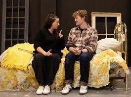 Carling Dulder as Anna and Eddy Sweeney as Wesley recalling the life-defining moments of their high school years during a rehearsal of the Peterborough Theatre Guild's production of "Midnight Madness" by award-winning Peterborough-born playwright Dave Carley. Directed by Jane Werger and produced by Diane Théberge, the heartfelt comedy runs for 10 performances from February 27 to March 14, 2026. (Photo: Jordan Lyall Photography)