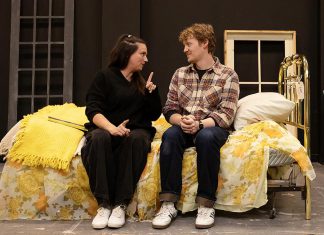 Carling Dulder as Anna and Eddy Sweeney as Wesley recalling the life-defining moments of their high school years during a rehearsal of the Peterborough Theatre Guild's production of "Midnight Madness" by award-winning Peterborough-born playwright Dave Carley. Directed by Jane Werger and produced by Diane Théberge, the heartfelt comedy runs for 10 performances from February 27 to March 14, 2026. (Photo: Jordan Lyall Photography)