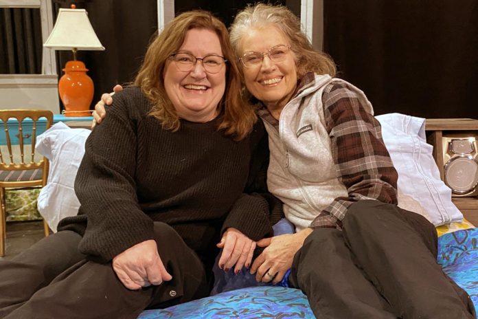 Producer Diane Théberge and director Jane Werger on the set of "Midnight Madness" at the Peterborough Theatre Guild. The heartfelt comedy by award-winning Peterborough-born playwright Dave Carley runs for 10 performances from February 27 to March 14, 2026. (Photo: Paul Rellinger / kawarthaNOW)