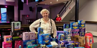 Elisha Rubacha, community campaign officer for the United Way Peterborough & District, collected more than 6,000 menstrual hygiene products for the organization's Period Promise campaign at the Women's Business Network of Peterborough Galentine's Day event on February 4, 2026. Formerly called Tampon Tuesday and now being held for its 10th year, the campaign aims to create conversations around period poverty and stigma while collecting a record-breaking 25,000 products to donate to the Kawartha Food Share for distribution to local partner agencies. (Photo courtesy of United Way Peterborough & District)