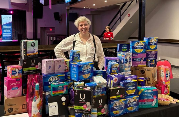 Elisha Rubacha, community campaign officer for the United Way Peterborough & District, collected more than 6,000 menstrual hygiene products for the organization's Period Promise campaign at the Women's Business Network of Peterborough Galentine's Day event on February 4, 2026. Formerly called Tampon Tuesday and now being held for its 10th year, the campaign aims to create conversations around period poverty and stigma while collecting a record-breaking 25,000 products to donate to the Kawartha Food Share for distribution to local partner agencies. (Photo courtesy of United Way Peterborough & District)