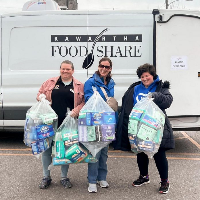 Representatives from Kawartha Food Share pick up menstrual hygiene products collected through the United Way Peterborough & District's 2019 Tampon Tuesday campaign, now known as Period Promise. Despite being a basic necessity for around half of the population, the products are often one of the least donated items to food banks, due to a lack of awareness of the need as well as the stigma that continues to surround menstruation. (Photo courtesy of Kawartha Food Share)