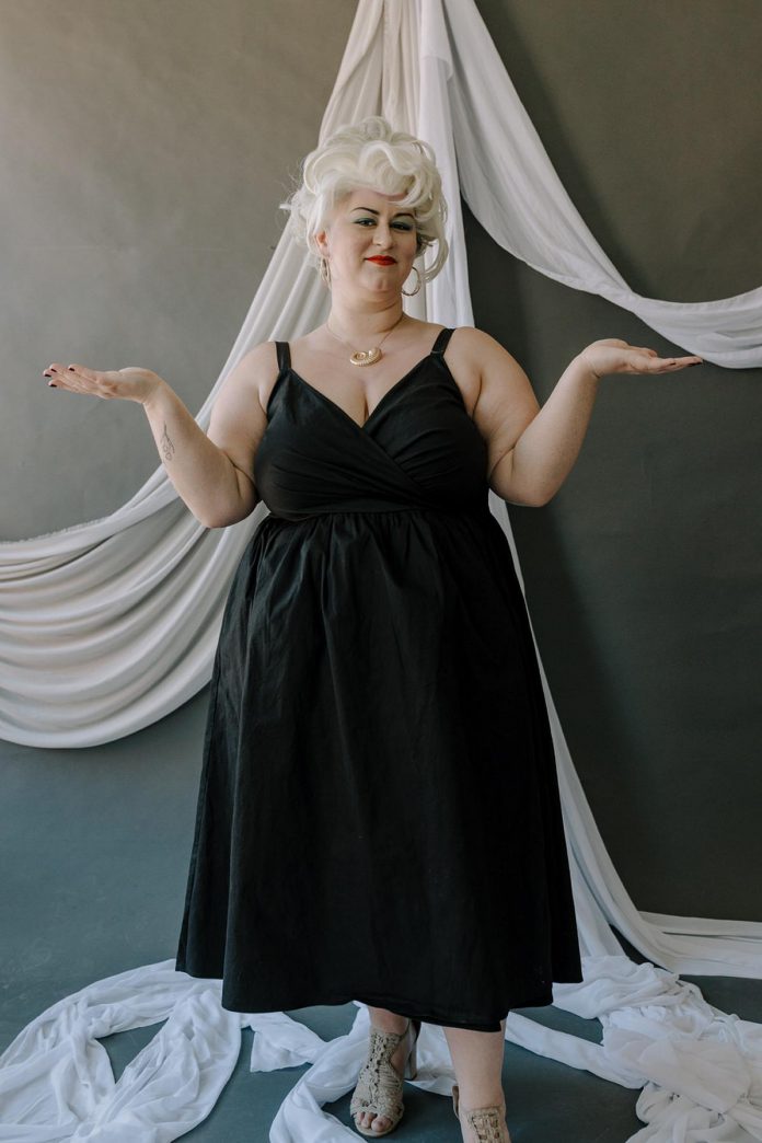 In Heather Doughty's "Villains" project, Nicole Lemke as Ursula the Sea Witch from "The Little Mermaid" explains that she was using her magic to give merfolk their voice and independence back. King Triton began spreading the narrative that she was dangerous because she was a threat to the companies who made profit off the insecurities of merfolk. The "true" stories of vilified women in history and fiction will be shown through photographs, audio recordings, and a video during the exhibition, which launches ahead of International Women's Day during the First Friday Art Crawl on March 6, 2026. (Photo: Heather Doughty Photography)