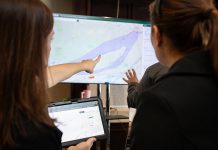 An Alto team member points to a map of the possible corridor between Ottawa and Toronto during an open house on the proposed high-speed rail network held at the McDonnel Street Activity Centre in Peterborough on February 26, 2026. (Photo: Jordan Lyall / kawarthaNOW)