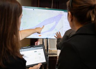 An Alto team member points to a map of the possible corridor between Ottawa and Toronto during an open house on the proposed high-speed rail network held at the McDonnel Street Activity Centre in Peterborough on February 26, 2026. (Photo: Jordan Lyall / kawarthaNOW)