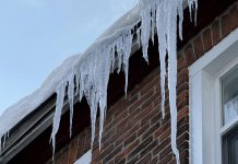 As accumulated roof snow and ice melts throughout March, it's not uncommon for homeowners to discover leaks inside their home. As well as causing damage to eavestroughs, ice dams can result in water seeping under shingles, resulting in leaks and mold and rot in the roof's trusses. Bullarco Roofing & Full Exteriors services Peterborough, Kawartha Lakes, and surrounding areas with a free roof analysis, snow and ice removal, and year-round metal and asphalt shingle roof replacements. (Photo courtesy of Bullarco Roofing & Full Exteriors)