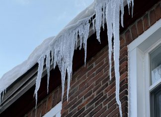 As accumulated roof snow and ice melts throughout March, it's not uncommon for homeowners to discover leaks inside their home. As well as causing damage to eavestroughs, ice dams can result in water seeping under shingles, resulting in leaks and mold and rot in the roof's trusses. Bullarco Roofing & Full Exteriors services Peterborough, Kawartha Lakes, and surrounding areas with a free roof analysis, snow and ice removal, and year-round metal and asphalt shingle roof replacements. (Photo courtesy of Bullarco Roofing & Full Exteriors)