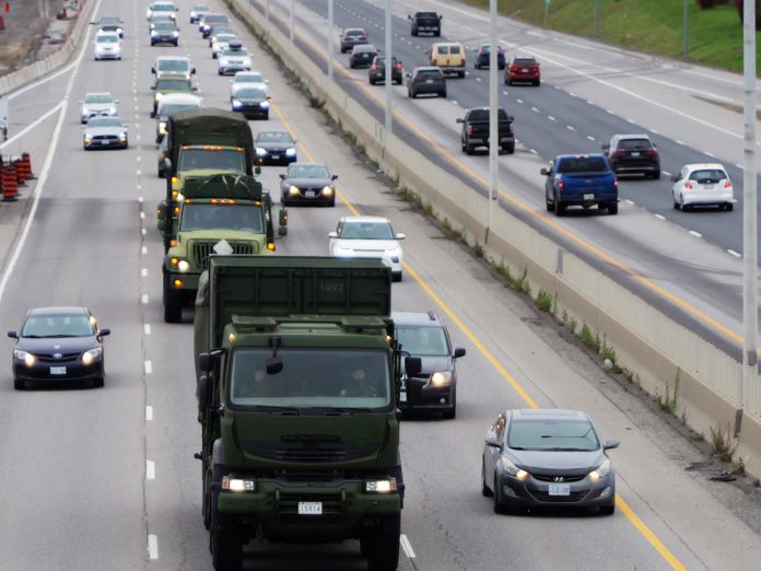 Canadian Armed Forces vehicles travelling on a highway. (Photo: Department of National Defence, Canadian Armed Forces) Canadian Armed Forces vehicles travelling on a highway. (Photo: Department of National Defence, Canadian Armed Forces)