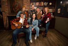The cast of the Capitol Theatre's production of the Broadway smash-hit musical "Come From Away," which runs from July 10 to August 2, 2026 at the historic venue in Port Hope, includes (front) Beau Dixon and Julie Lumsden and (back) Melissa Payne, Kyle Blair, Kyle Golemba, and Donna Garner. (Photo: Sam Moffatt)